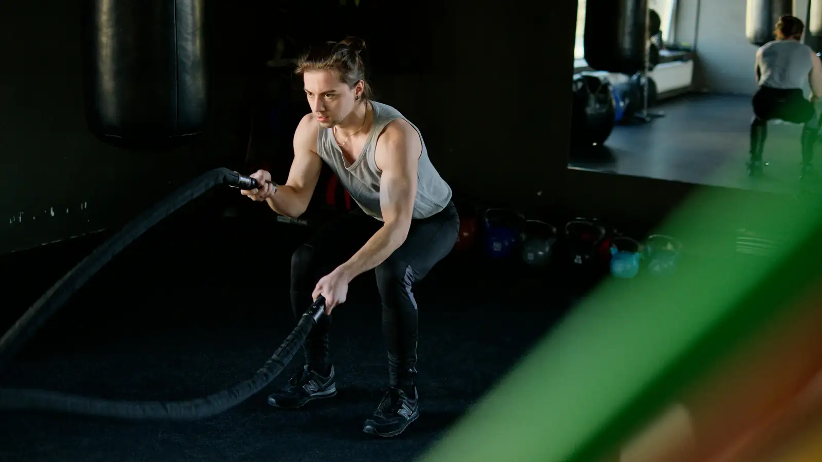 Athlete doing a battle rope workout